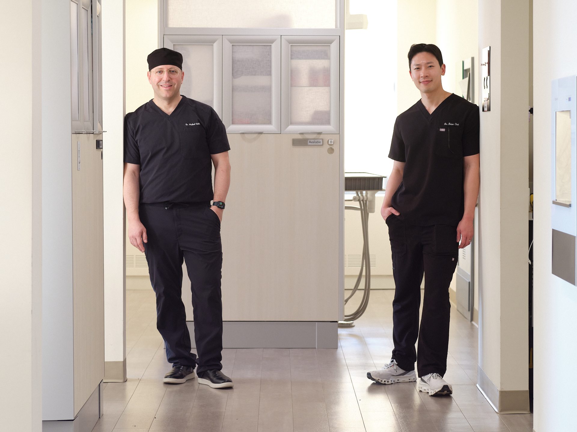 Dr. Zidile and Dr. Choi in the treatment corridor at Brooklyn Periodontics